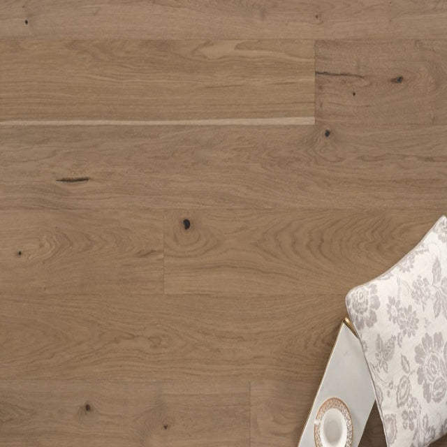 Achieve a luxurious and generous 7½" wide-plank effect at a very affordable price with Tempo. This rustic-grade hardwood in oak  features brushed veneer, lively grain patterns and rich color variations. Some designs from the collection include additional touches, such as filled knots and custom stain treatments.