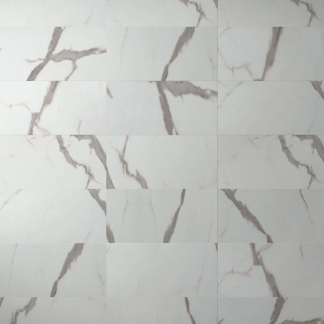 White rectangular wall tiles with a gray marble-look veining pattern, arranged in a grid pattern.

Torlys EverTile™ Premier Calcatta Luxury Vinyl, a wide plank, low sheen floor available at Alberta Hardwood Flooring.