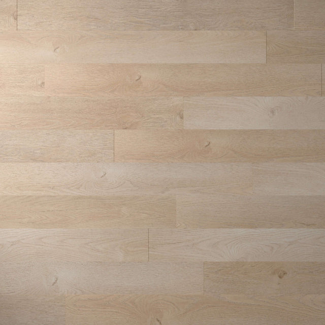 Light natural wood flooring planks arranged in a staggered pattern, showing visible grain and knots.

Torlys Rigidwood™ Marshland Luxury Vinyl. Wide laminate planks with realistic finishes and unmatched quality, available with install at Alberta Hardwood Flooring.