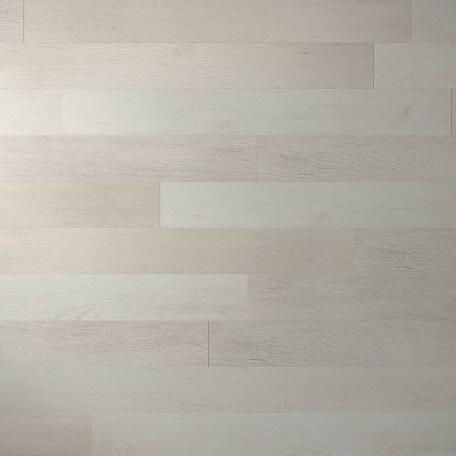 Light natural oak wood flooring planks arranged in a staggered pattern, showing subtle grain textures in pale beige and off-white tones.

Torlys Rigidwood™ Addington Oak Luxury Vinyl. Wide laminate planks with realistic finishes and unmatched quality, available with install at Alberta Hardwood Flooring.