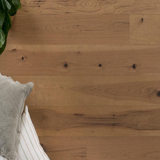 Achieve a luxurious and generous 7½" wide-plank effect at a very affordable price with Tempo. This rustic-grade hardwood in hickory features brushed veneer, lively grain patterns and rich color variations. Some designs from the collection include additional touches, such as filled knots and custom stain treatments. Available with install at Alberta Hardwood Flooring. 