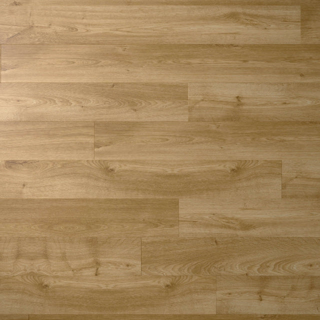 Torlys Grand View Vulcan Oak, wide laminate planks with realistic finishes and unmatched quality, available with install at Alberta Hardwood Flooring.