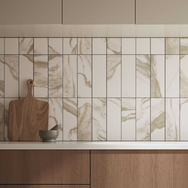 Ceratec Vernazza Porcelain Tiles, available with install at Alberta Hardwood Flooring. Visit one of our showrooms to view in person, and to obtain pricing for this product.

Capturing the beauty of natural Calacatta Gold marbles, the Vernazza series offers the richness and depth of natural stone in a durable porcelain tile. Bring a touch of timeless elegance to your space with Vernazza's gold-veined tiles.