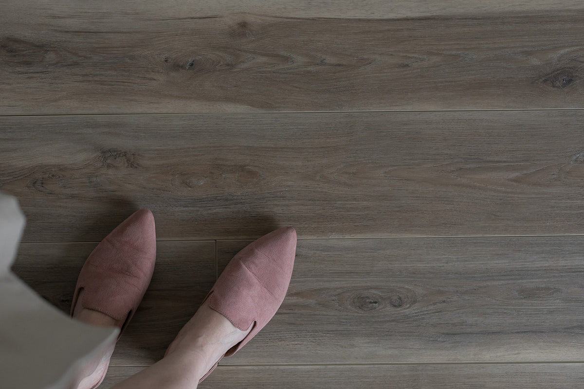 Megan, from the Ethos Legacy WPC Luxury Vinyl Plank  LVP collection, available at Alberta Hardwood Flooring. This is a high variation floor. 