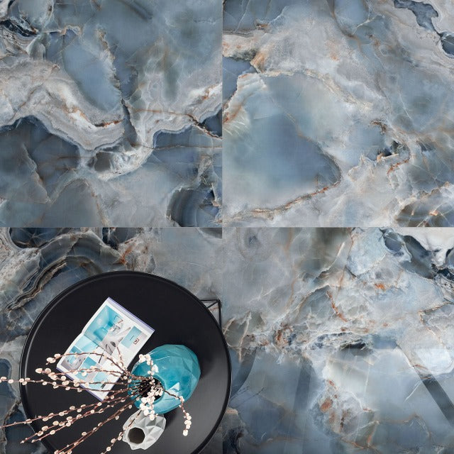 Ames Onice Real Porcelain Floor/Wall Tile. Available with install, at Alberta Hardwood Flooring.  Inspired by the rare colour varieties of Persian Onyx. This collection has 3 color options, and is available in large format tile or a slab option. 