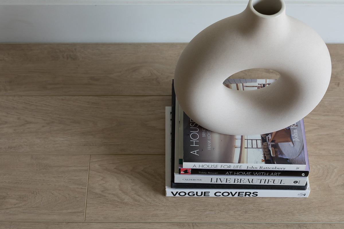 Presley, from the LVP Luxury Vinyl Plank collection, available at Alberta Hardwood Flooring.  Creating an inviting space is as easy as adding the golden hues of this flooring. Simply choose this colorway and see an authentic, approachable ambiance come to life.