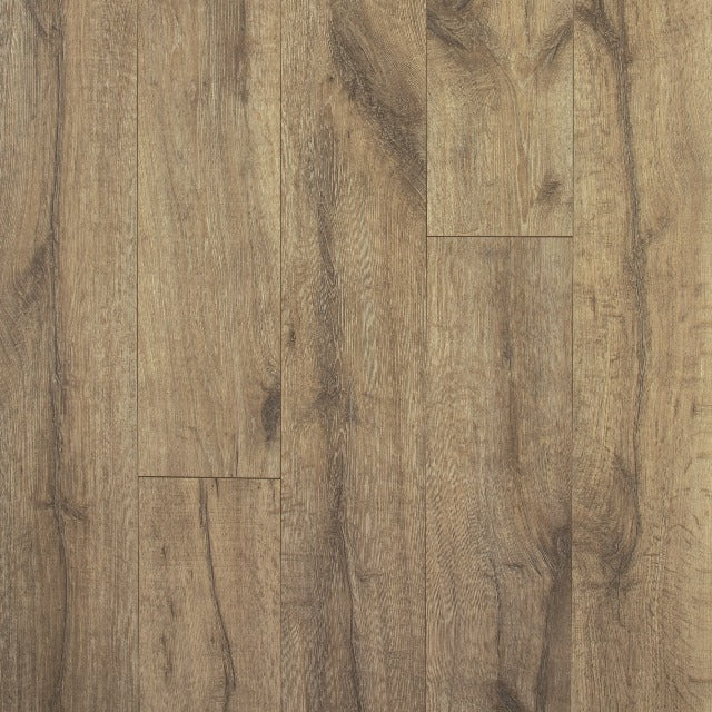 Torlys Reclaime Jefferson Oak Laminate, a vintage inspired collection, in a wide plank, available at Alberta Hardwood Flooring.