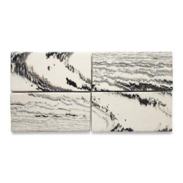 Ann Sacks Shaye Porcelain Wall TIle, available with install, at Alberta Hardwood Flooring.  Shaye, a series of marbled and standard field tiles inspired by the swirls of Old World Florentine paper design, joins Ann Sacks porcelain tile offerings. Shaye, offered in four marbled and five standard color options, will create an illusionary wall and floor application of elegant distinction.