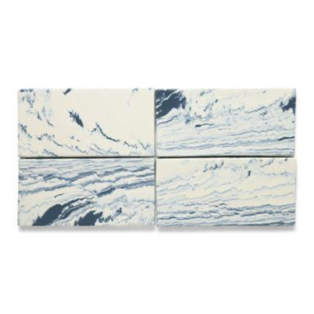 Ann Sacks Shaye Porcelain Wall TIle, available with install, at Alberta Hardwood Flooring.  Shaye, a series of marbled and standard field tiles inspired by the swirls of Old World Florentine paper design, joins Ann Sacks porcelain tile offerings. Shaye, offered in four marbled and five standard color options, will create an illusionary wall and floor application of elegant distinction.