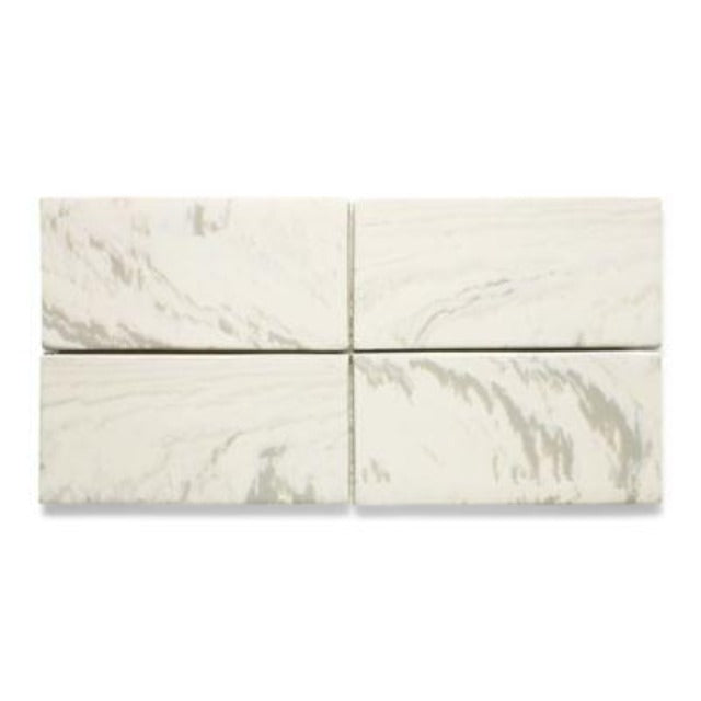 Ann Sacks Shaye Porcelain Wall TIle, available with install, at Alberta Hardwood Flooring.  Shaye, a series of marbled and standard field tiles inspired by the swirls of Old World Florentine paper design, joins Ann Sacks porcelain tile offerings. Shaye, offered in four marbled and five standard color options, will create an illusionary wall and floor application of elegant distinction.